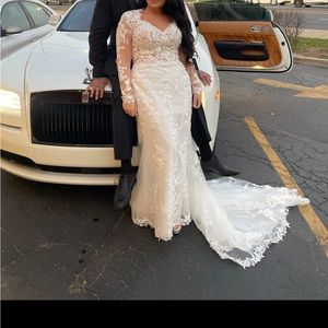 Maggie Sottero size 12 wedding dress. Gently worn. Beautiful intricate lace.